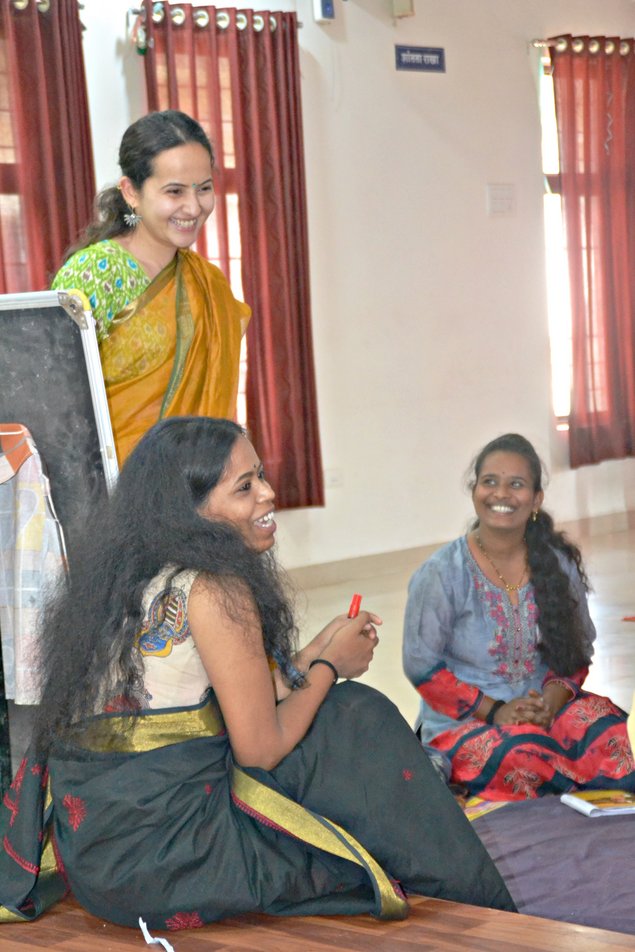 Mrs Shruti Shukla and two trainees laughing 